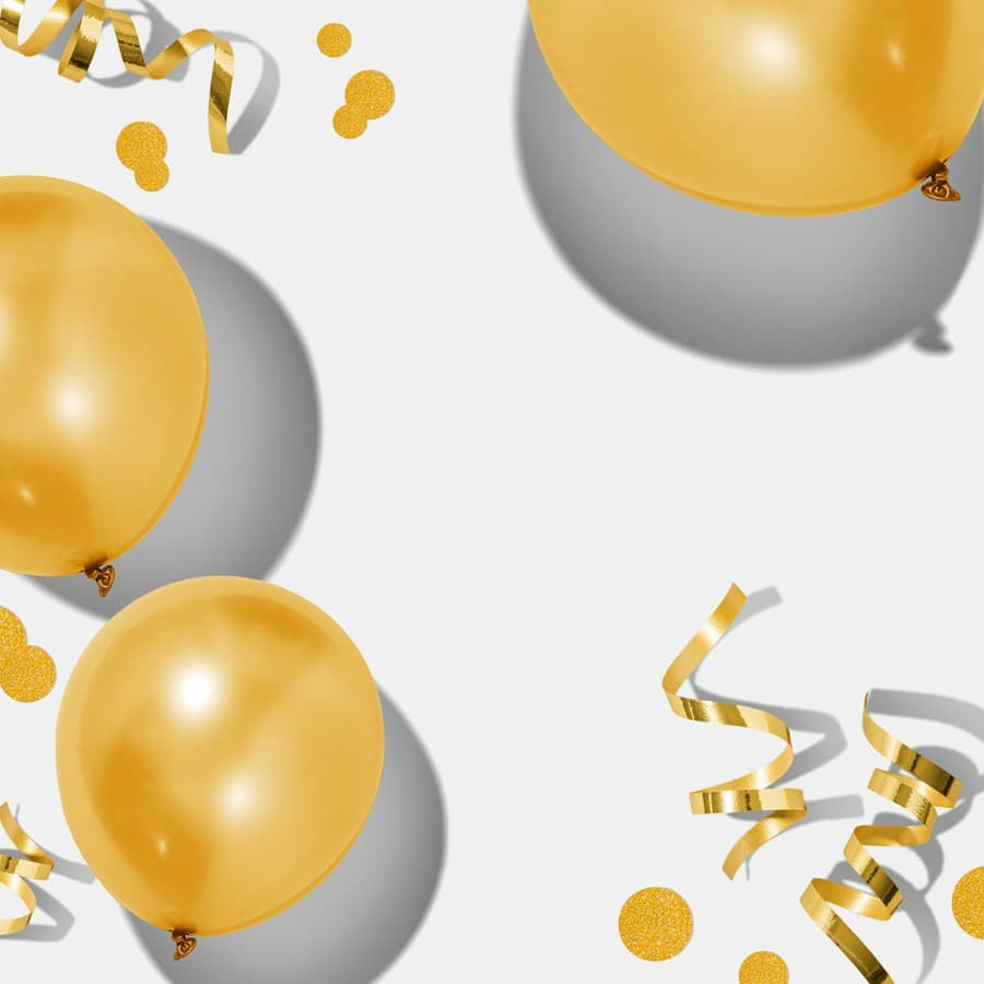 Gold balloons and ribbons